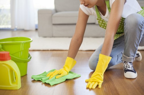 Vacuuming carpets during a move out cleaning service in Fulham